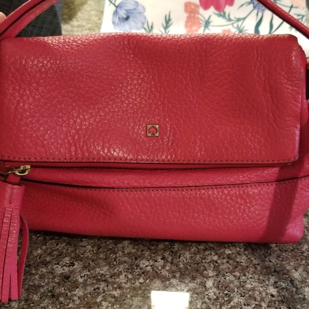 Bright pink Kate Spade crossbody bag